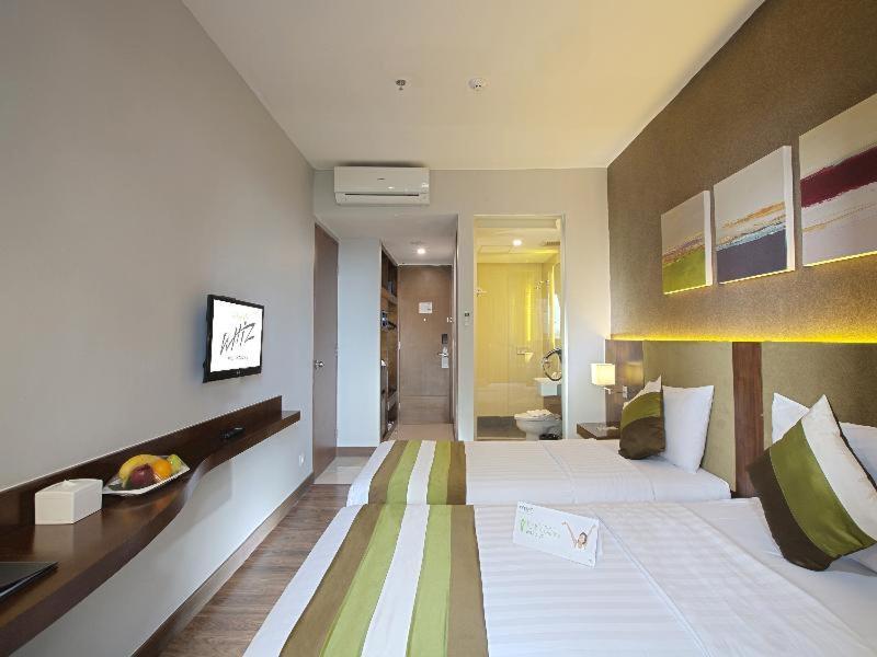 El Hotel Jakarta Rum bild